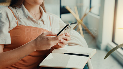 Buy stock photo Phone, notebook and hands of woman in home for finance journal, planning or investment information. Cellphone, diary and female person with research for online banking on mobile app in apartment.