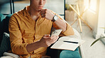 Thinking, notebook and man with phone in home for finance journal, planning or investment information. Cellphone, idea and male person with diary for online banking on mobile app in apartment.