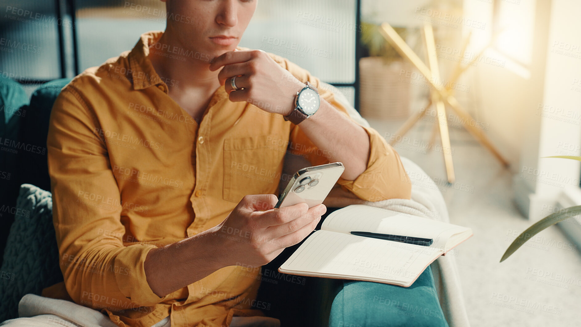 Buy stock photo Thinking, notebook and man with phone in home for finance journal, planning or investment information. Cellphone, idea and male person with diary for online banking on mobile app in apartment.