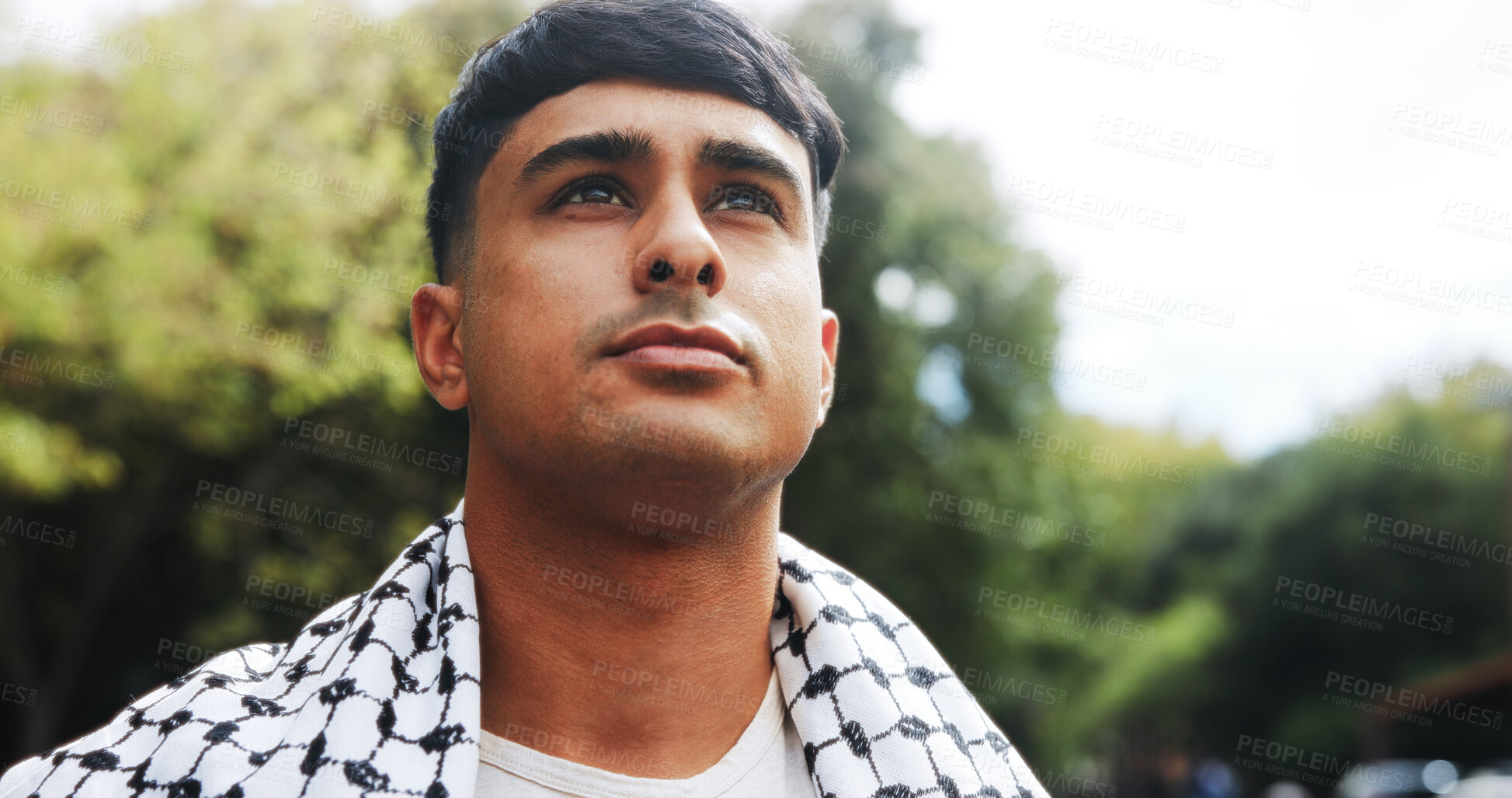Buy stock photo Thinking, man and keffiyeh scarf in city for islamic culture, traditional and national identity. Person, thoughts and solidarity for Palestine resistance, political awareness and planning for freedom
