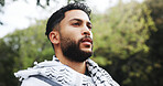 Thinking, man and outdoor with keffiyeh scarf for islamic culture, Eid Mubarak and traditional. Person, thoughts and solidarity ideas for Palestine resistance, political awareness and support freedom