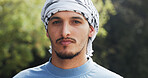 Portrait, man and pride with keffiyeh scarf for islamic culture, Eid Mubarak and traditional. Person, fabric and solidarity for Palestine resistance, political awareness and protest for Gaza freedom