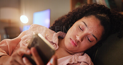 Buy stock photo Girl, phone and sad on sofa with texting, contact and typing chat with mobile app in living room. Woman, smartphone and notification for breakup, depression and lying with social network at house