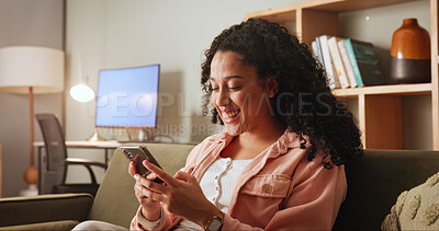 Buy stock photo Home, smile and woman with smartphone, relax and texting with message to contact, app and chat. Apartment, mobile user and happy person on couch, cellphone and communication with connection in lounge