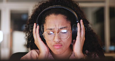 Buy stock photo Woman, relax and laptop with headphones at house for listening to music, streaming audio and night. Female person, tech and online podcast, sound connection and subscribe for overtime entertainment
