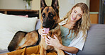 Home, woman and affection for dog, hug or love for german shepherd in living room, pet and adoption. Happy, owner and person with rescue animal in lounge, bonding and care for canine with loyalty