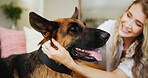 Home, woman and love for dog, petting and affection for german shepherd in living room and adoption. Happy, owner and person with rescue animal in lounge, bonding and care for canine with loyalty