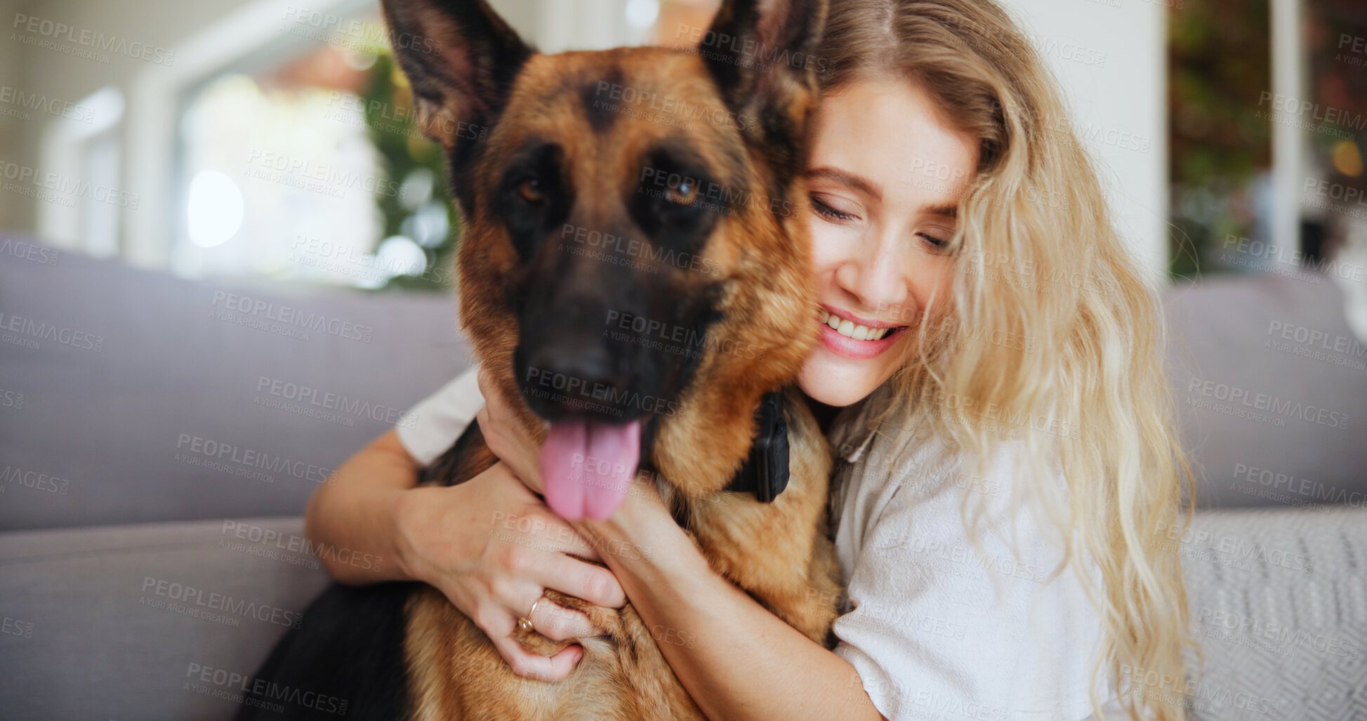Buy stock photo Home, woman and hug for dog, living room and affection for german shepherd, companion and apartment. Happy, owner and person with domestic animal, embrace and love for rescue pet in lounge or house