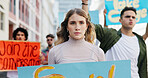 Community, angry and woman with poster in city for announcement, human rights or power. Group, transformation and people in protest with sign for rally, justice or society for change in government