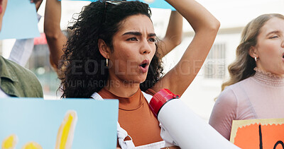 Buy stock photo Community, angry and woman with megaphone in city for announcement, rights or power. Speaker, transformation and people in protest with bullhorn for rally, justice or freedom for change in government