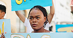 Angry, rally and woman with poster in city for announcement, human rights and power. People, revolution and crowd in protest with sign for activism, justice and community for change in government