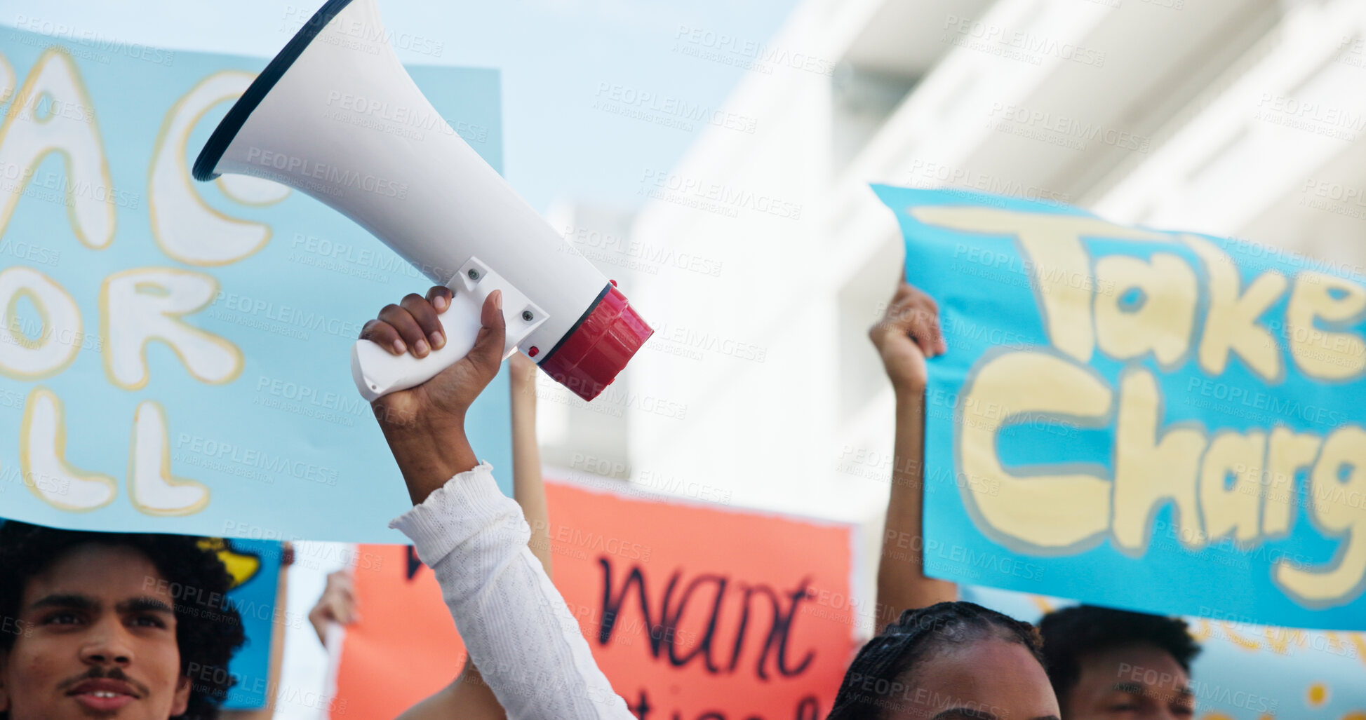 Buy stock photo Strike, people and hands with megaphone in city for inflation, human rights and cost of living. Speaker, community and group in protest with bullhorn for rally, justice or higher wages for change
