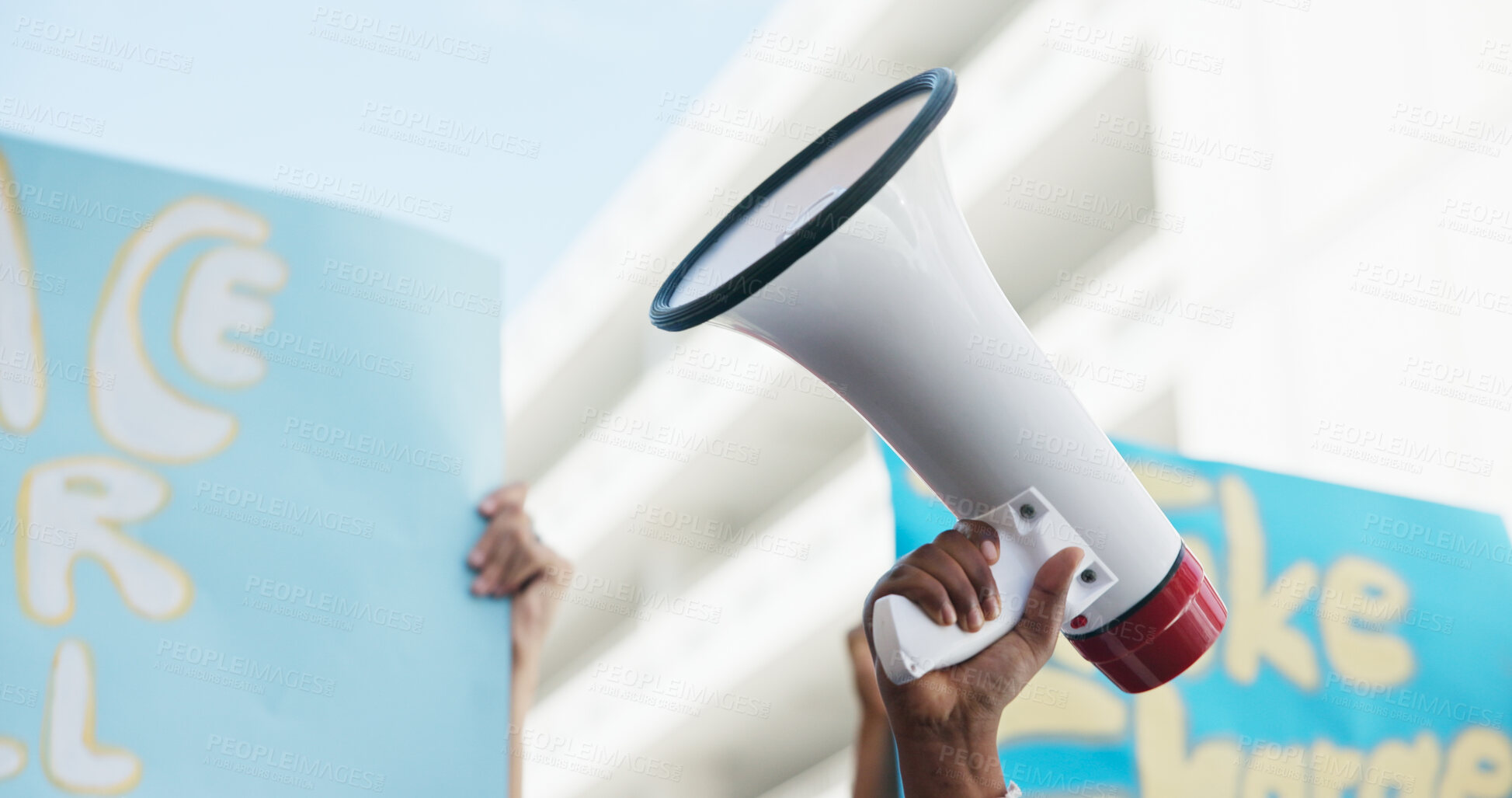 Buy stock photo Poster, people or hands with megaphone in city for inflation, human rights or cost of living. Speaker, prices or group in community protest with bullhorn for rally, justice or higher wages for change