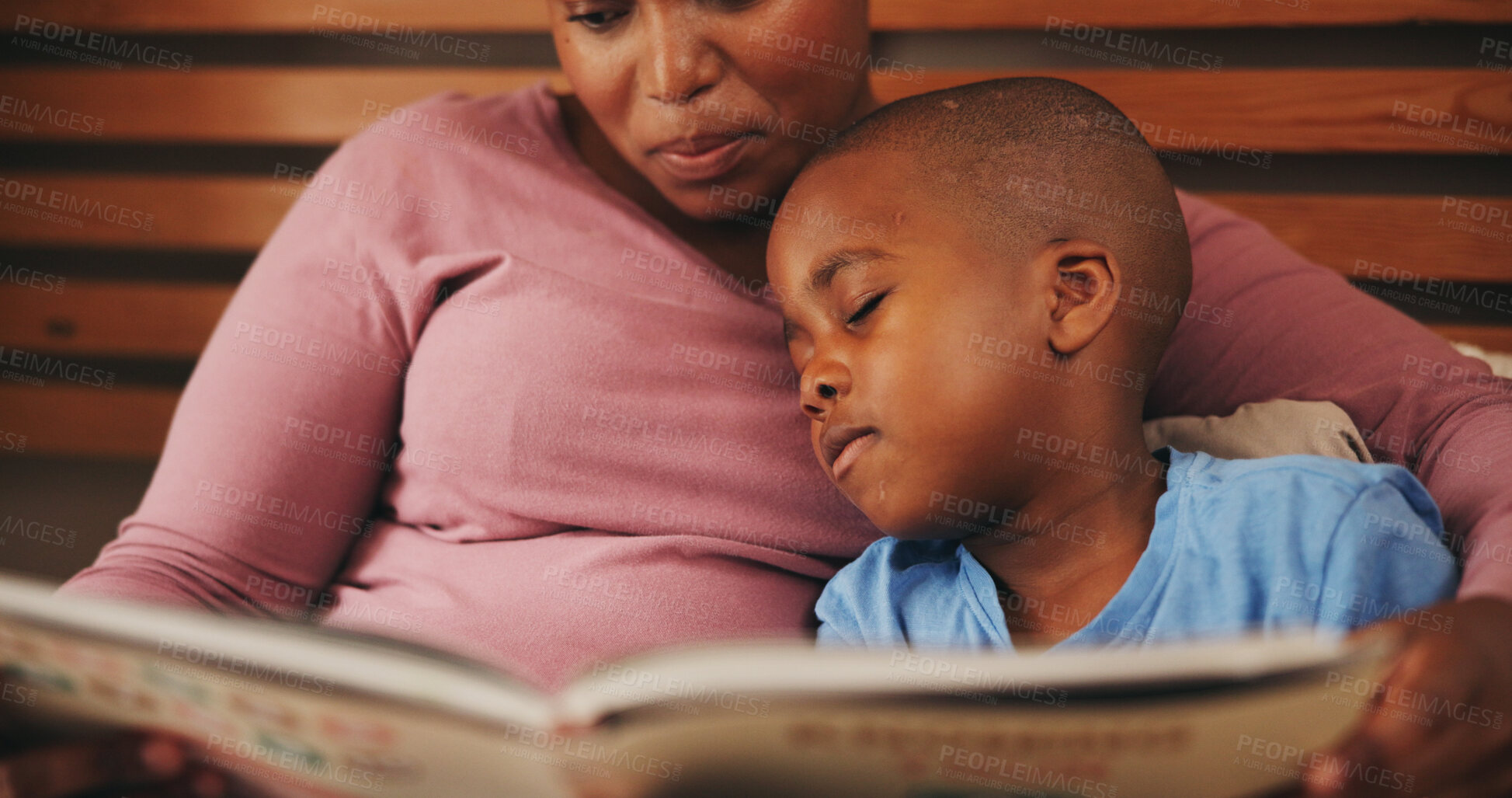 Buy stock photo Home, reading book and mother with boy, sleepy and bonding together with hobby. African family, mama and son with knowledge, learning and child development with fatigue, literacy and bedtime story