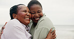 Happy, mother and daughter with hug on beach for travel, summer holiday and getaway. Smile, African family and embrace with mature woman, tropical vacation and bonding together for affection on trip