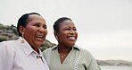 Smile, mother and daughter on beach outdoor for travel, summer holiday and getaway. Women, African family and laugh with mature woman for ocean trip, tropical vacation and bonding together in nature
