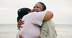 Happy, mother and black woman with hug on beach for travel, holiday and family trip. Outdoor, African parent and embrace with mature mom, tropical vacation and affection for love or bonding together