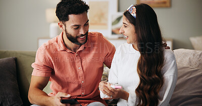 Buy stock photo Couple, phone and happy on sofa with pregnancy test, results and excited with fertility in home. People, man and woman with stick, smile and good news for baby, success and love with support at house