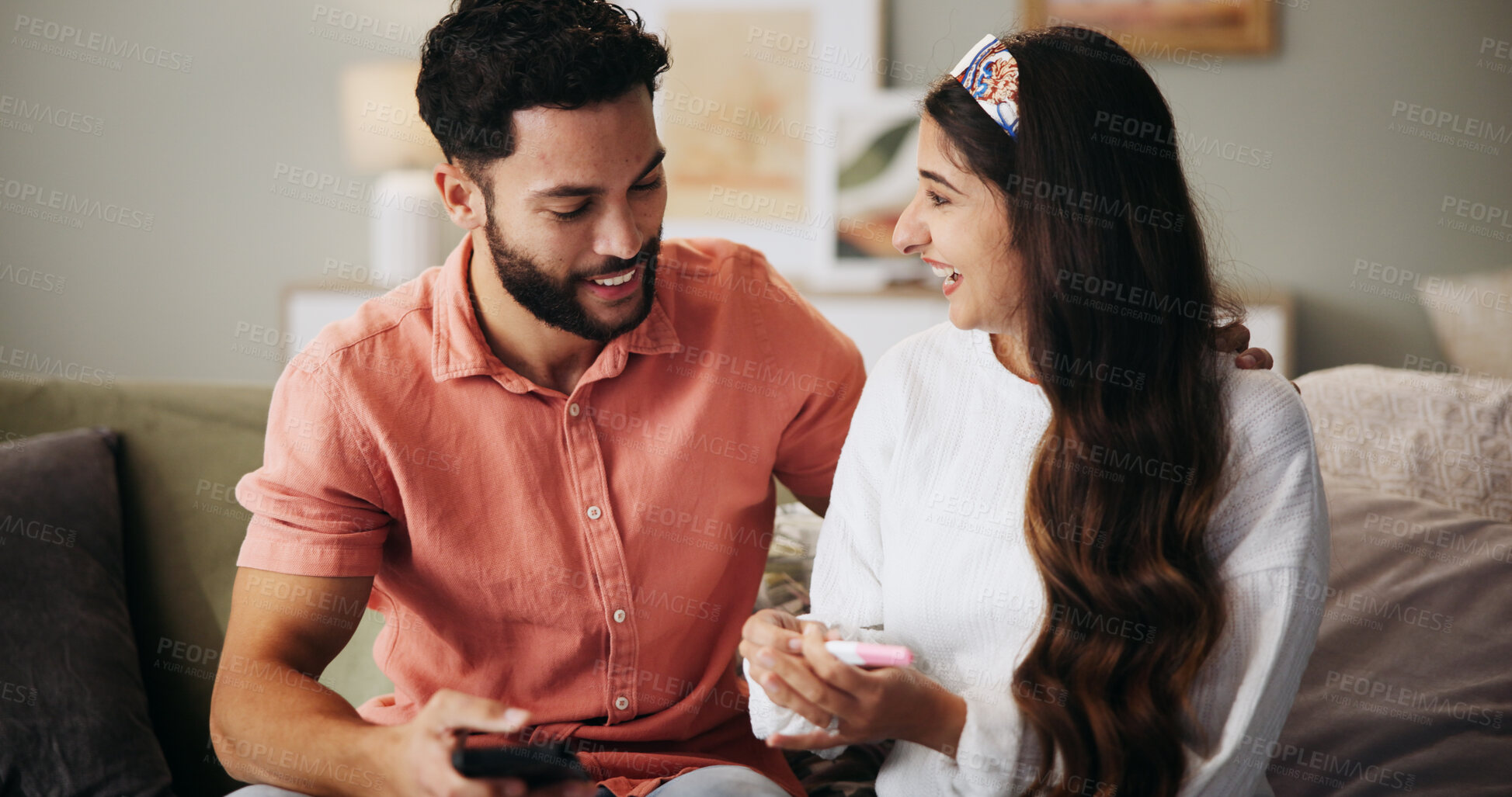 Buy stock photo Couple, phone and happy on sofa with pregnancy test, results and excited with fertility in home. People, man and woman with stick, smile and good news for baby, success and love with support at house