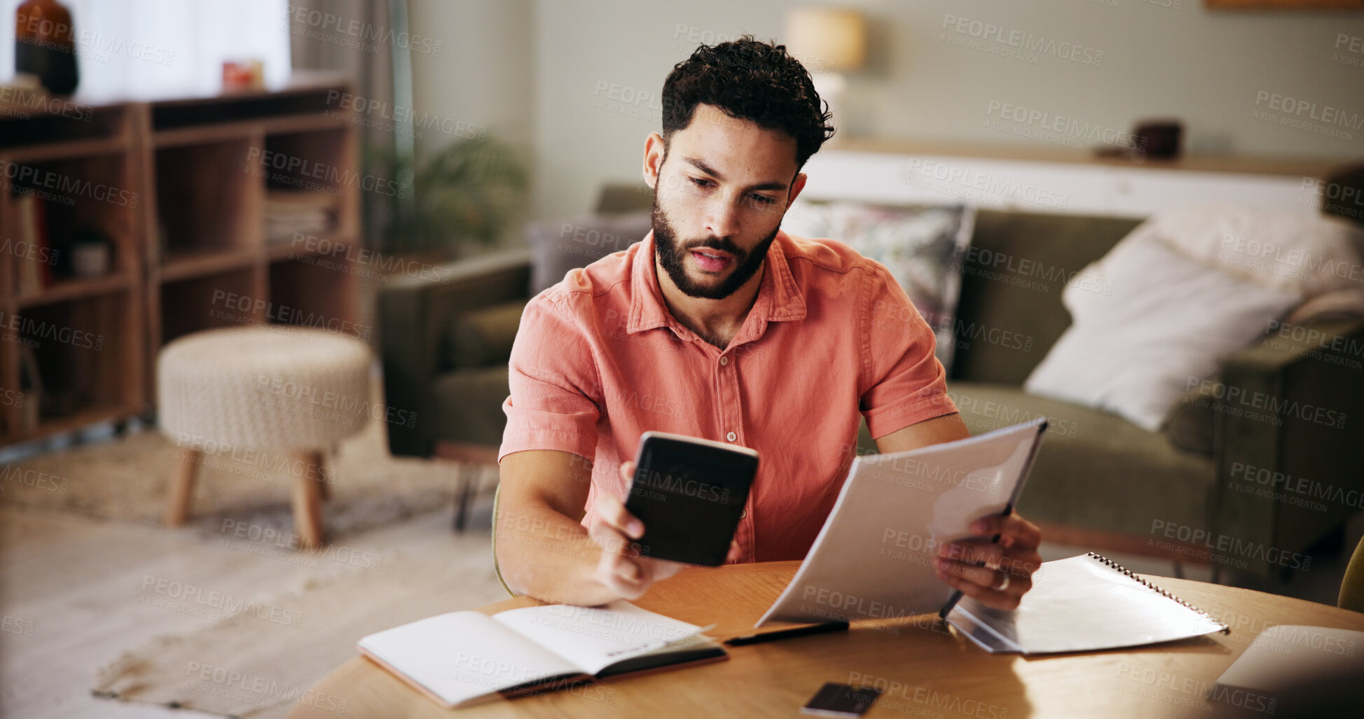 Buy stock photo Finance, calculator and man in home with paperwork for budget planning, savings and investment. Accounting, reading and person with documents, bills and invoice for financial review, taxes and report