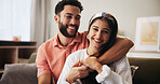 Hug, couple and love in living room with smile, bonding and communication on sofa in apartment. Embrace, man and woman with portrait in house for relationship, support and relax in home lounge