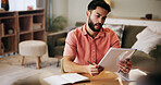 Finance, reading and man in home with paperwork for budget planning, savings and investment. Accounting, confused and person with documents, bills and invoice for financial review, taxes and report