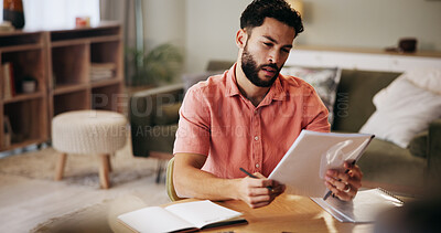Buy stock photo Finance, reading and man in home with paperwork for budget planning, savings and investment. Accounting, confused and person with documents, bills and invoice for financial review, taxes and report