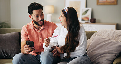 Buy stock photo Couple, phone and excited on sofa with pregnancy test, results or happy for fertility in home. People, man and woman with stick, smile and surprise for baby, IVF success or tech with support at house