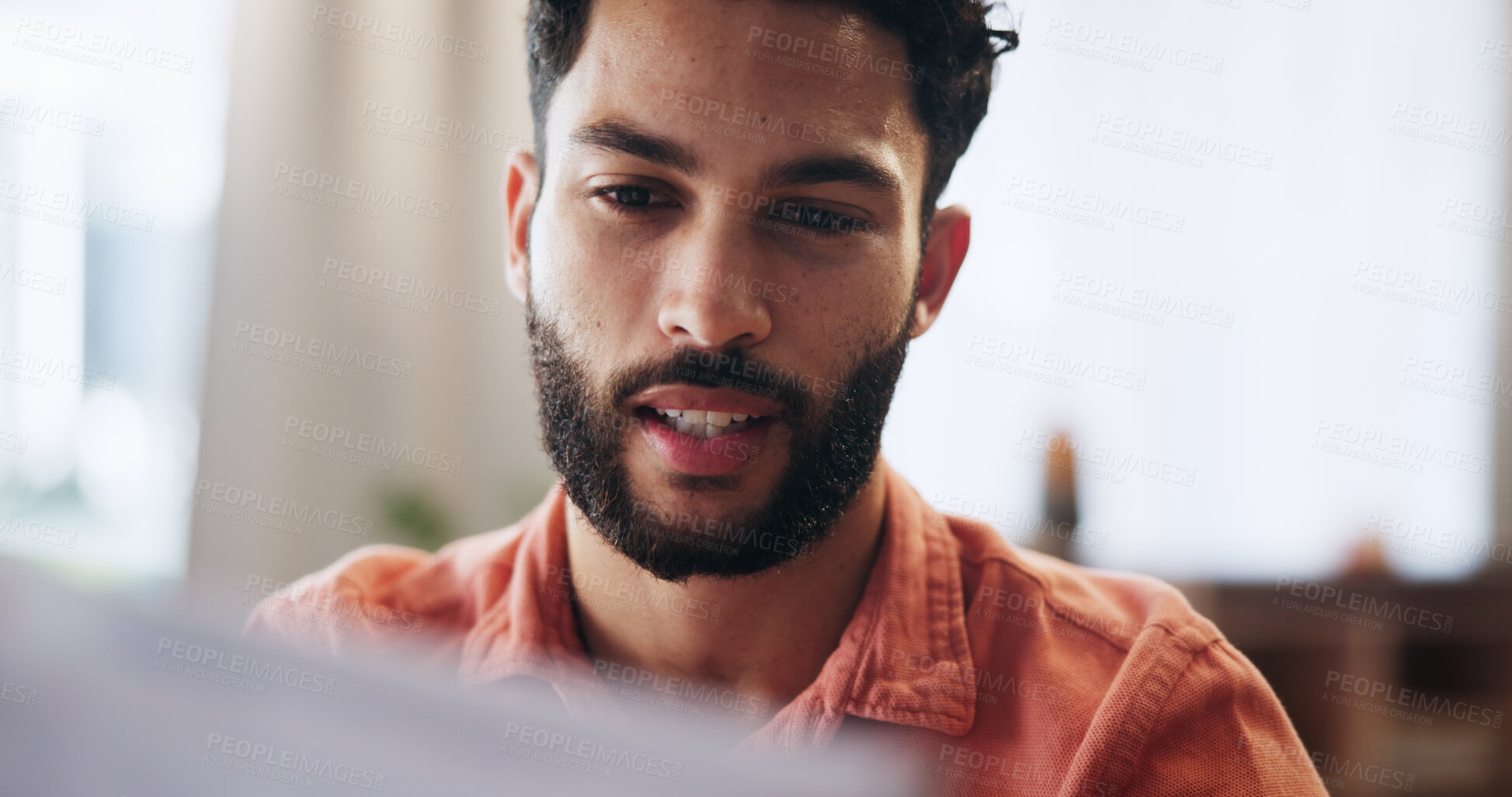 Buy stock photo Reading, finance and man with documents in home for mortgage, loan payment and taxes. Worry, apartment and person with paperwork, bills and report for budget, financial planning and review savings