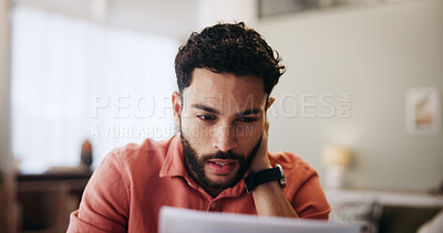 Buy stock photo Confused, finance and man with paperwork in home for mortgage, loan payment and taxes. Worry, apartment and person with documents, bills and report for budget, financial planning and review savings