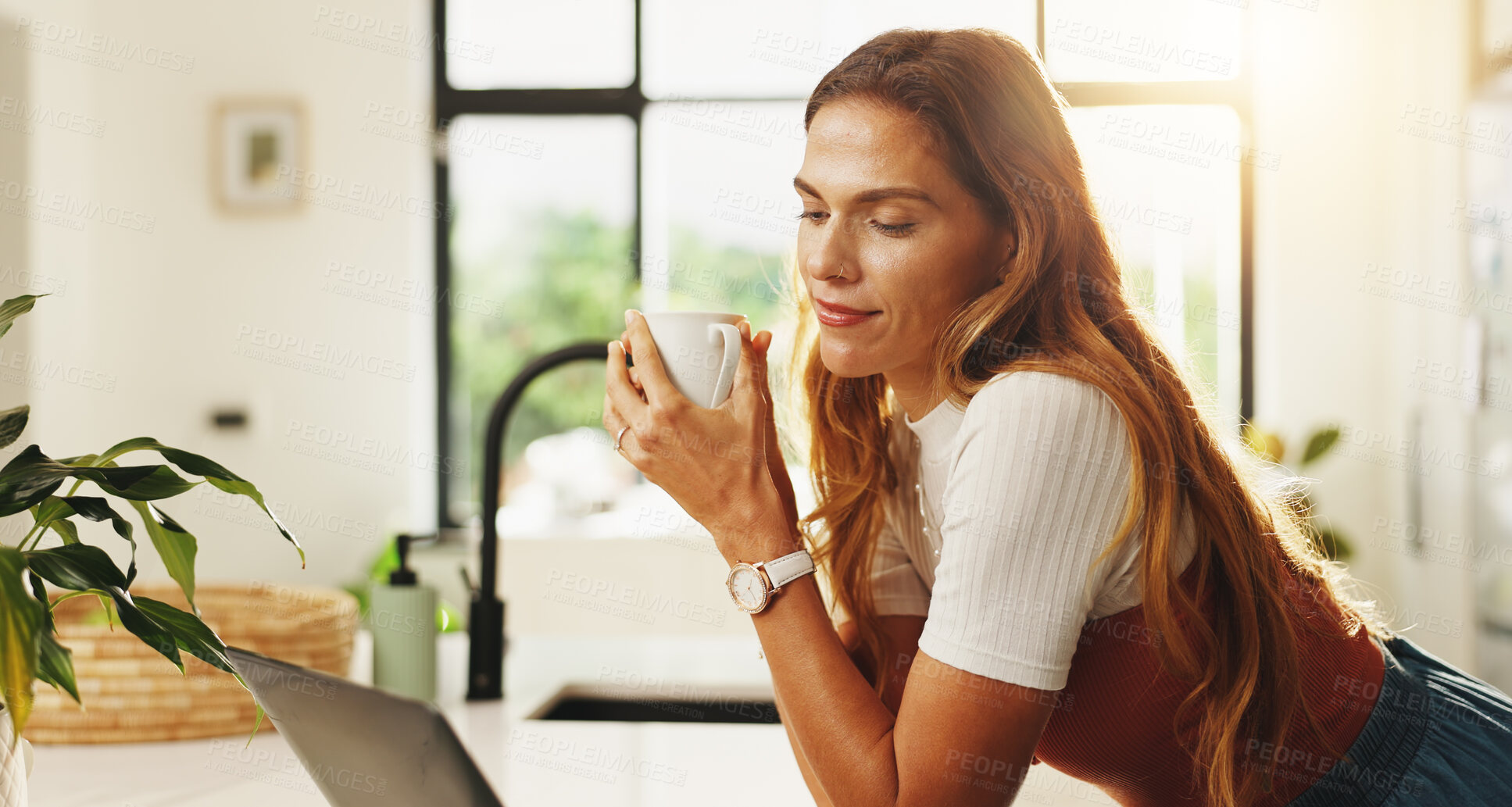 Buy stock photo Reading, laptop and woman with coffee, kitchen or planning for article on social media or apartment. Remote work, blogger and person with tech for post on website, thinking and tea in morning or home