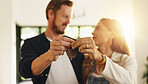 Happy couple, hands and new home with keys for moving in, relocation or fresh start together. Man, woman or owners with access to apartment, building or asset for real estate or property at house