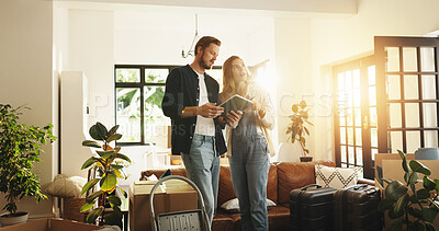 Buy stock photo Couple, tablet or planning in new home for interior design, DIY research or decor together. Man, woman or moving in with technology, luggage or boxes for renovation, remodeling or ideas at house