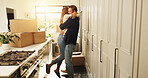 Happy couple, hug and moving in with boxes for new home, fresh start or beginning together. Man, woman or lovers with embrace, packages or relocation for property, investment or security at house