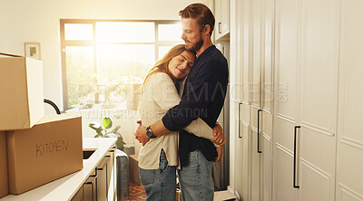 Buy stock photo Smile, couple and hug with boxes at new house of relocation, investment and bonding together. People, embrace and affection, moving property and relationship commitment with security of home purchase