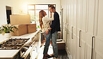 Smile, couple and love with boxes at new house of relocation, investment and bonding together. People, embrace and affection, moving property and relationship commitment for security of home purchase
