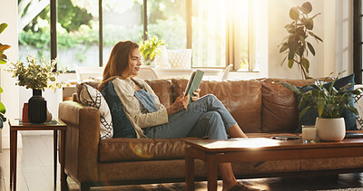 Buy stock photo Tablet, relax and woman on sofa in home for reading online blog, newsletter or research on plants. Digital technology, house and female person on mobile app for ebook on botany in living room.