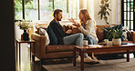 Angry, argue or couple fight in home with cheating, affair or liar on couch with marriage or fail. Talk, frustrated or upset people on sofa in toxic relationship with divorce risk, stress or mistake