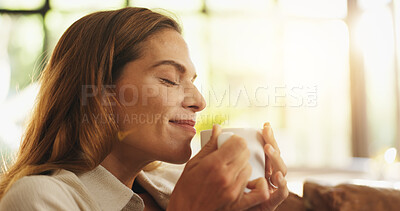 Buy stock photo Woman, smell coffee and smile in home with reflection, memory or profile to start morning in lounge. Person, tea cup and happy with aroma, thinking or relax on sofa in living room with drink in house