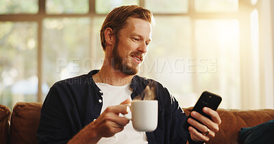 Buy stock photo Relax, coffee and man with phone on sofa for social media, online networking and chat on mobile app. Happy, weekend and person with drink on smartphone for internet, contact and message notification