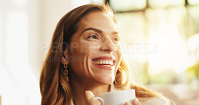 Buy stock photo Home, thinking and woman with smile, coffee and morning with mocha brew, weekend break and funny. Apartment, humor and mature person on sofa, cappuccino and start day with herbal tea and reflection