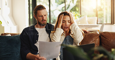 Buy stock photo Stress, finance and couple on laptop with paperwork for bills, mortgage payment and online banking. Home, marriage and man with upset woman on computer for digital taxes, loans and financial crisis