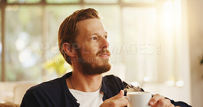 Buy stock photo Home, thinking and man on sofa, coffee and morning with mocha brew, weekend break and idea. Apartment, memory and person on couch, cappuccino and start day with herbal tea and reflection in lounge