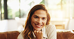 Portrait, smile and woman relax at house for peace, morning start and satisfaction of weekend. Happy, female person and cozy for free time, break and chilling on couch with bokeh for wellness on sofa