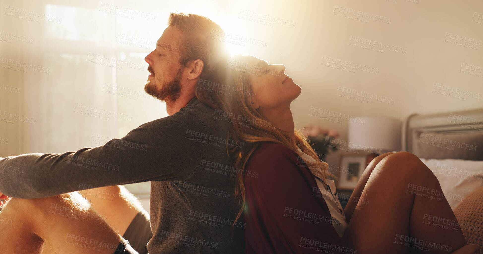 Buy stock photo Love, relax and support with couple in bedroom of home together for bonding or morning romance. Dating, rest or wellness with man and woman sitting on bed in apartment for safety, security or trust