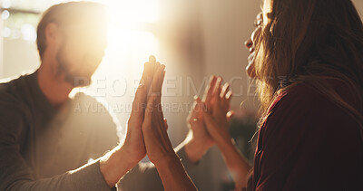 Buy stock photo Home, hands together and couple in lounge, love and bonding with support. Romance, lens flare and man with woman, kindness and relationship with affection, happiness or marriage in living room