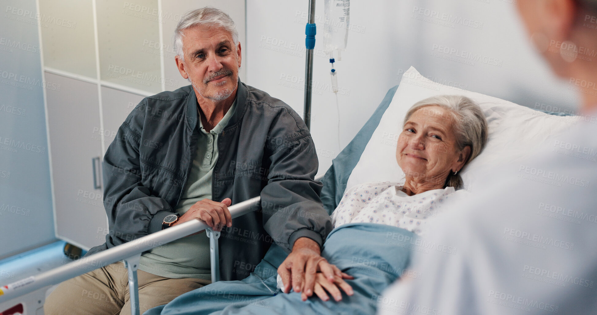 Buy stock photo Consultation, doctor and senior couple in hospital, conversation and cancer treatment. Healthcare, medical emergency or old woman in bed, elderly man and illness with recovery, wellness and support