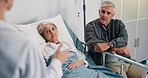 Healthcare, doctor and old couple in hospital, conversation and advice for cancer treatment. Diagnosis, medical emergency and senior woman with elderly man, recovery and consultation with illness