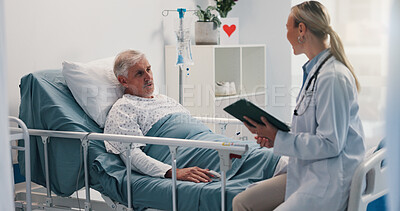 Buy stock photo Doctor with tablet, consulting and old man in hospital bed for healthcare, diagnosis or test results. App, conversation or medical records with medicine professional and senior patient in clinic
