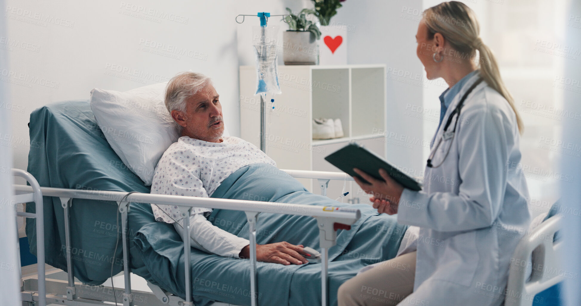 Buy stock photo Doctor with tablet, consulting and old man in hospital bed for healthcare, diagnosis or test results. App, conversation or medical records with medicine professional and senior patient in clinic